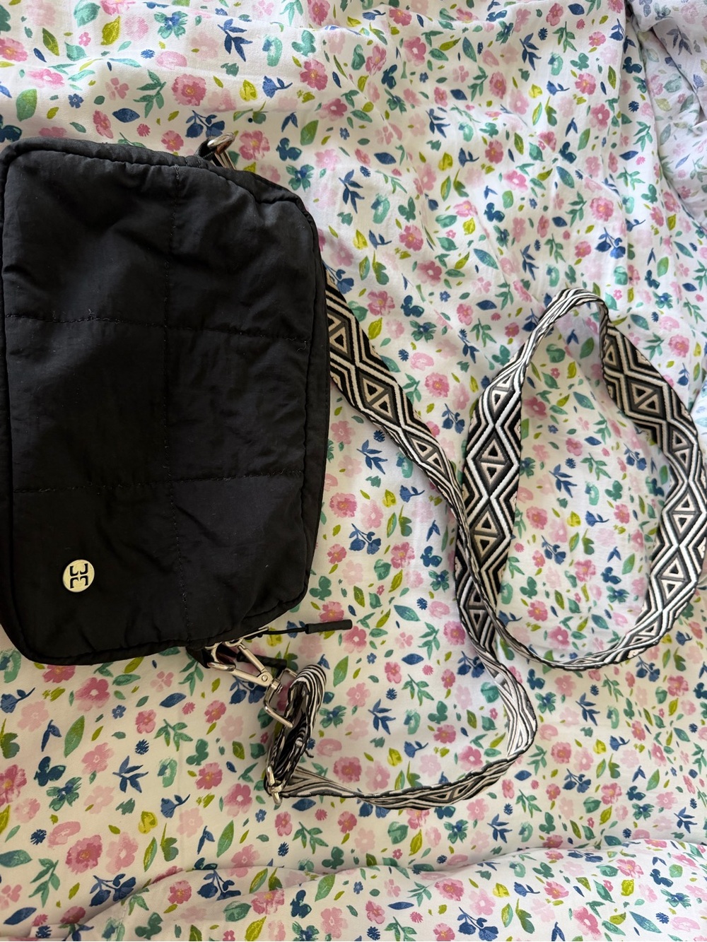 Black Quilted Crossbody Bag with Patterned Strap